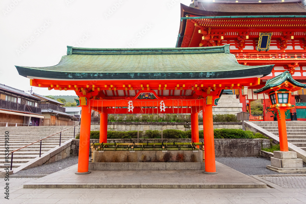 Fushimi Inari shrine temple with its red gates and sacred buildings in Kyoto, Japan. Fushimi Inari shrine temple with its red gates and sacred buildings in Kyoto, Japan.