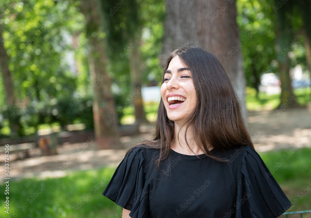 beautiful brunette 30 years old smiling and laughthing at the park, lifestile and happyness beautiful brunette 30 years old smiling and laughthing at the park, lifestile and happyness