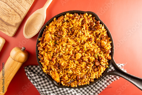 Baião de Dois traditional Brazilian food with rice, beans, sausage and rennet cheese close up photo