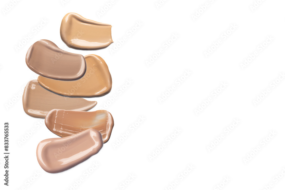A few swatches foundation smudge texture isolated on a white background, swatches of cosmetics A few swatches foundation smudge texture isolated on a white background, swatches of cosmetics