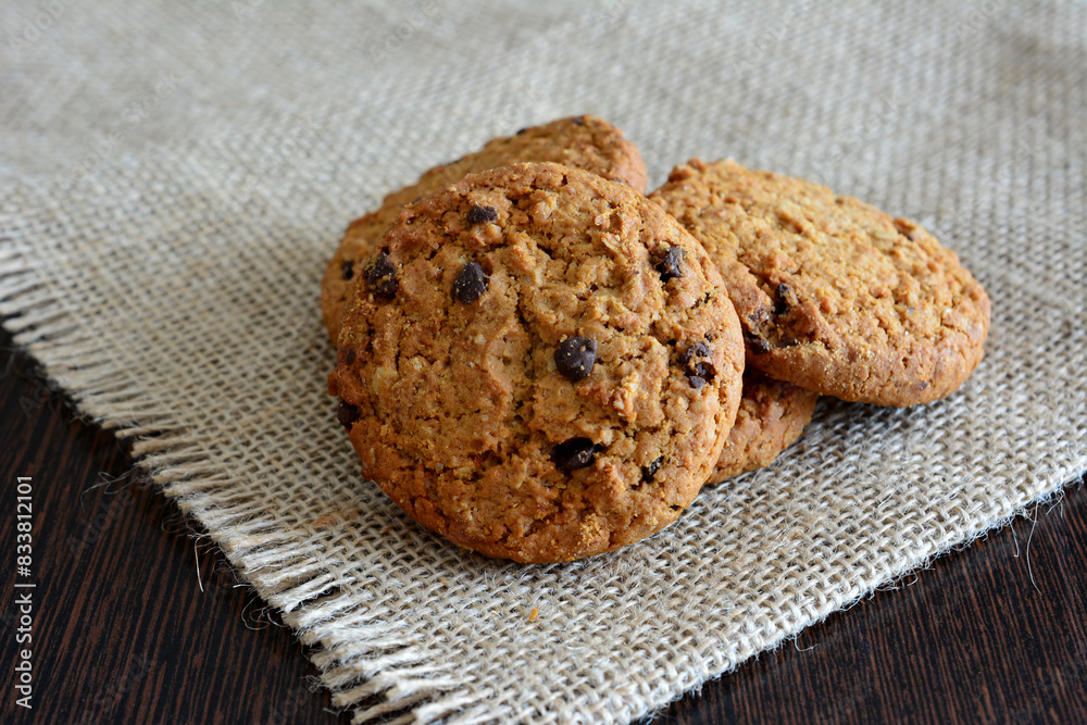 chocolate chip cookies on a table with burlap napkin chocolate chip cookies on a table with burlap napkin