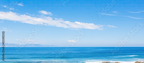 Scenic ocean view landscapes under a clear blue sky with copy space image.