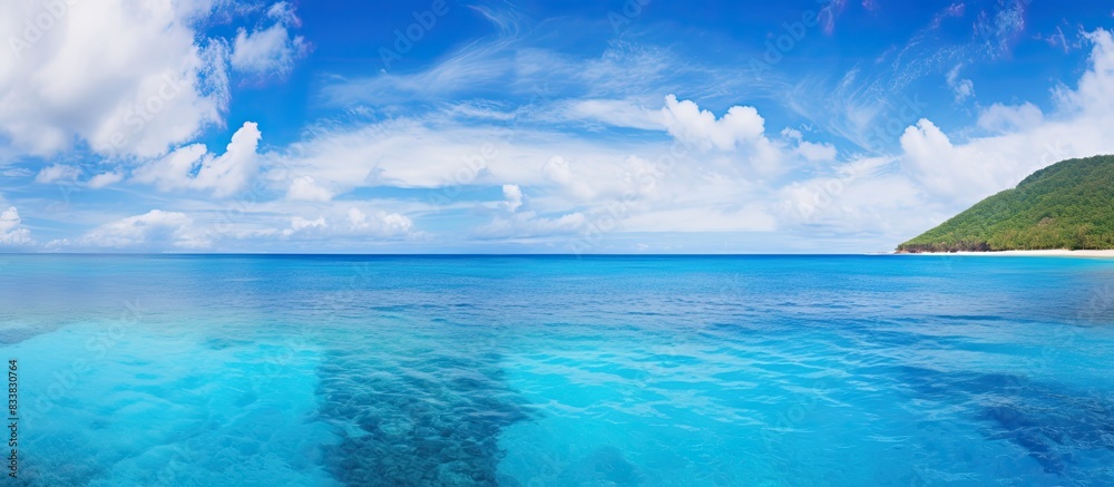 Saipan features deep blue waters, creating a scenic backdrop with a copy space image. Saipan features deep blue waters, creating a scenic backdrop with a copy space image.