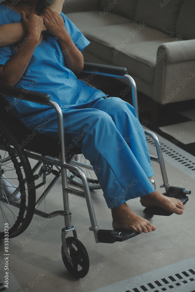 Doctor giving hope. Close up shot of young female physician leaning forward to smiling elderly lady patient holding her hand in palms. Woman caretaker in white coat supporting encouraging old person Doctor giving hope. Close up shot of young female physician leaning forward to smiling elderly lady patient holding her hand in palms. Woman caretaker in white coat supporting encouraging old person