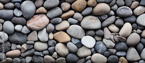 Background made of stones provides a natural and rustic touch to the copy space image.