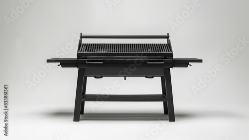 Sleek minimalistic design of a fordable barbecue setup against pure background photo