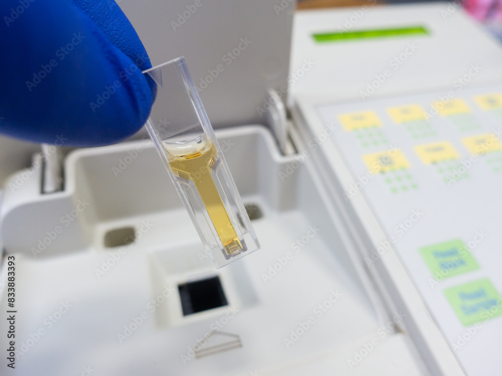 Optical measurement of the color of the test liquid in a cuvette using a spectrophotometer. Optical measurement of the color of the test liquid in a cuvette using a spectrophotometer.