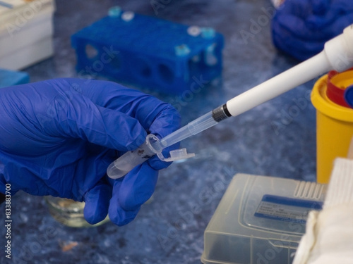 Draw the sample from a small test tube using an automatic pipette.
