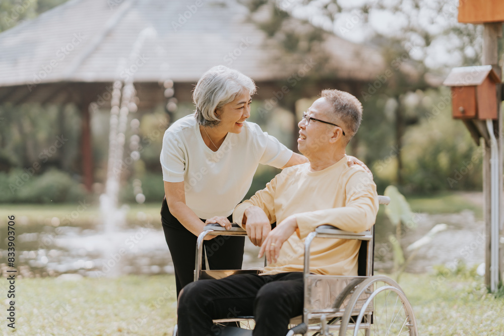 Elderly couple. Asian elderly couple giving love to each other smiling happily. Love and care for each other. Elderly couple. Asian elderly couple giving love to each other smiling happily. Love and care for each other.