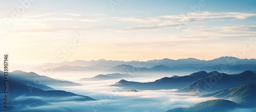 Scenic misty sunrise over m...