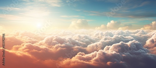 Morning sunlight illuminates a sky with a hint of clouds, providing a serene copy space image.