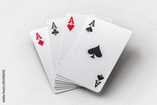 Four playing cards on a table, great for poker or card game scenes