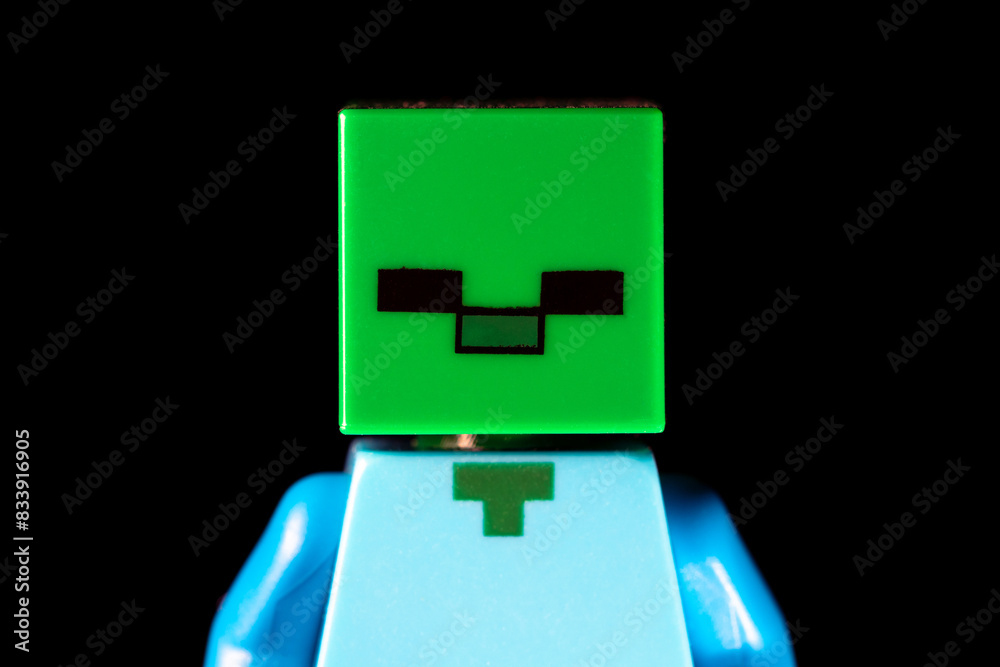 Naklejka premium Face of LEGO Minecraft Zombie mob with green square face