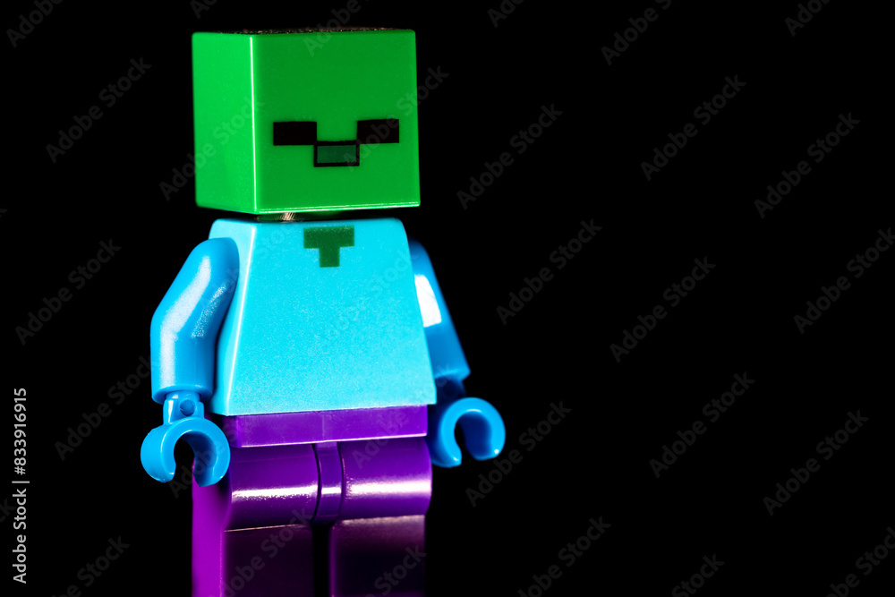 Naklejka premium Side view of LEGO Minecraft Zombie mob with green square face