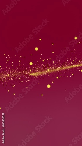 Gold tiny dots glitter on magenta pink gradient background that approach and recede at the center. Vertical abstract stars backdrop party or Christmas holidays and New Year concept with copy space