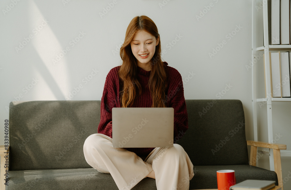 The happiness of an entrepreneur, a beautiful Asian business woman For online shopping, enjoy social media and laptop at The happiness of an entrepreneur, a beautiful Asian business woman For online shopping, enjoy social media and laptop at