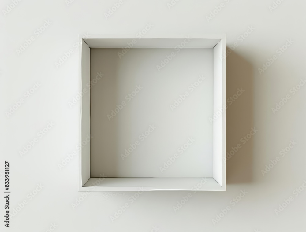 Minimalist white frame casting shadows on a beige wall, illuminated by sunlight, illustrating simplicity and modern artistic design.
Minimalist white frame casting shadows on a beige wall, illuminated by sunlight, illustrating simplicity and modern artistic design.