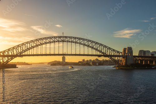 Fototapeta Naklejka Na Ścianę i Meble -  Awesome sunset with the famous Harbour Bridge as primordial subject, in Sydney, New South Wales, Australia.