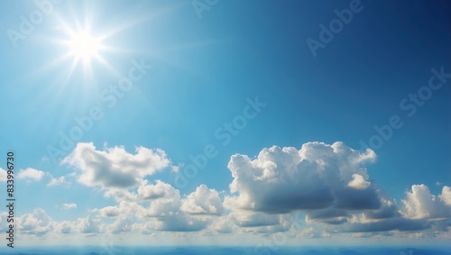 Divine presence Blue sky background with tiny clouds and rays of light.