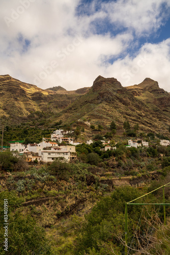 Obraz na płótnie Houses on a rocky terrain mountain of gran canaria in Spain against blue sky in summer w salonie