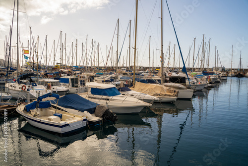 Obraz na płótnie Motor boats docked in Puerto de Mogan, a small fishing port on island Gran Canaria, Spain w salonie
