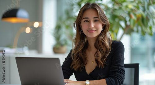 Woman Sitting in Front of Laptop Computer