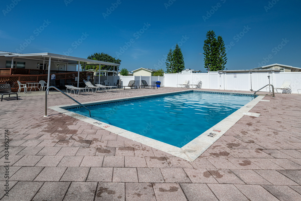 Fototapeta premium pool, swimming, water, resort, hotel, holiday, travel, vacation, summer, beach, tropical, sea, luxury, relaxation, sky, palm, relax, swimming pool, leisure, blue, sun, tree, spa, villa, ocean