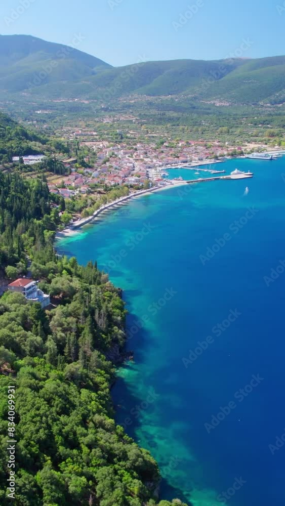 Aerial view of a beautiful Kefalonia island in Greece. Following coastal road through forest and shore with turquoise sea water to Sami port town. Travel destination of the Zante island in Greece. Aerial view of a beautiful Kefalonia island in Greece. Following coastal road through forest and shore with turquoise sea water to Sami port town. Travel destination of the Zante island in Greece.