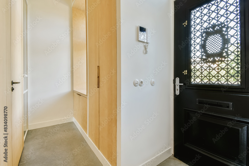 Modern Home Entryway with Decorative Security Door Modern Home Entryway with Decorative Security Door