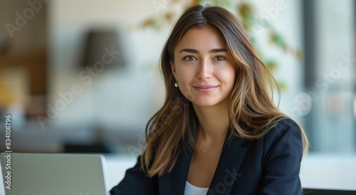 Woman Sitting in Front of Laptop Computer