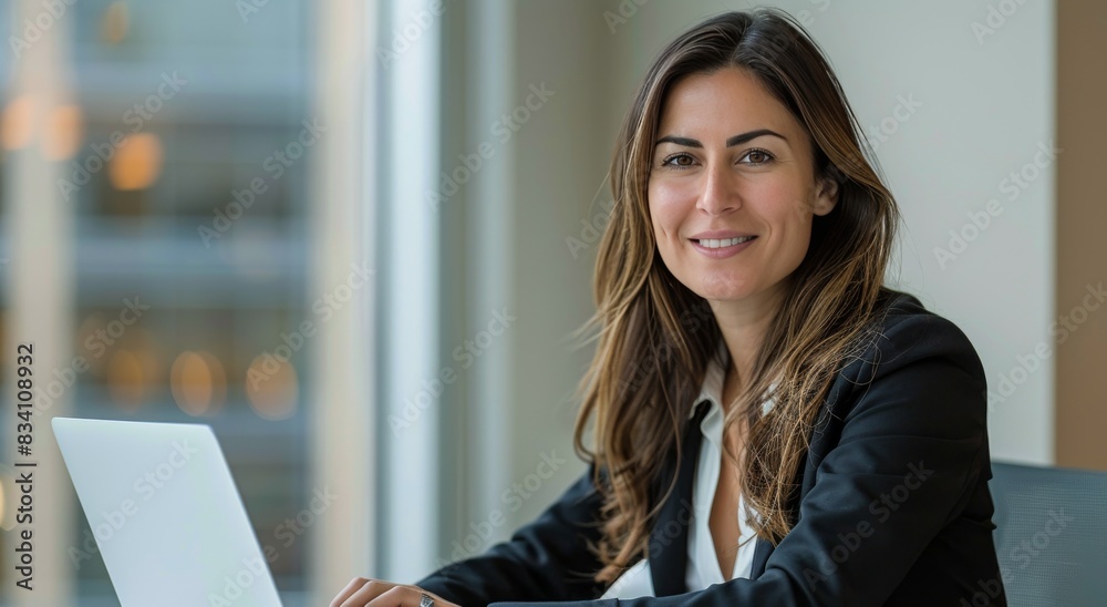 Woman Sitting in Front of Laptop Computer