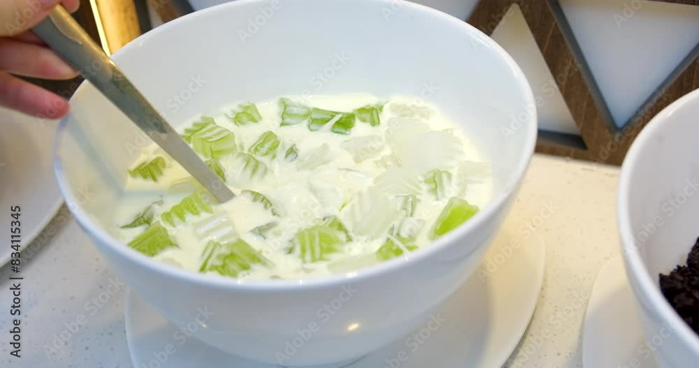 jelly green pieces Jelly pudding. liquid viscous additives to drinks Authentic Che Thai Vietnamese fruit cocktail. Vietnamese Grass Jelly. Milk Dessert jelly green pieces Jelly pudding. liquid viscous additives to drinks Authentic Che Thai Vietnamese fruit cocktail. Vietnamese Grass Jelly. Milk Dessert