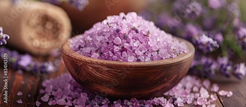Lavender scented sea salt in a wooden bowl