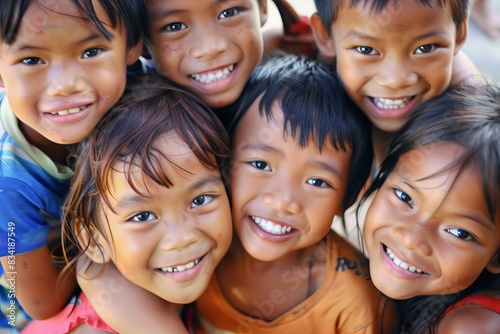 Group of happy smiling asian children in the park, Thailand.