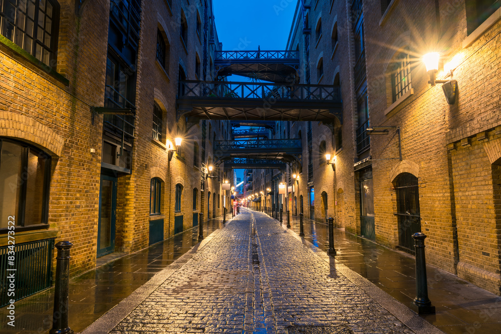 Fototapeta premium Street view of Shad Thames, a historic riverside street next to Tower Bridge in Bermondsey