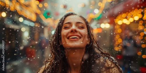 A joyful woman dancing in the rain 