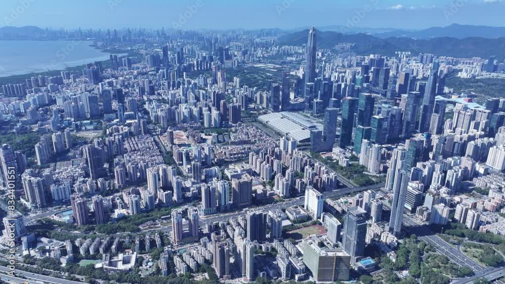 Explore the towering skyline of Shenzhen's Futian and Luohu CBD districts, epitomizing the Greater Bay Area's thriving economic powerhouse near Hong Kong Explore the towering skyline of Shenzhen's Futian and Luohu CBD districts, epitomizing the Greater Bay Area's thriving economic powerhouse near Hong Kong
