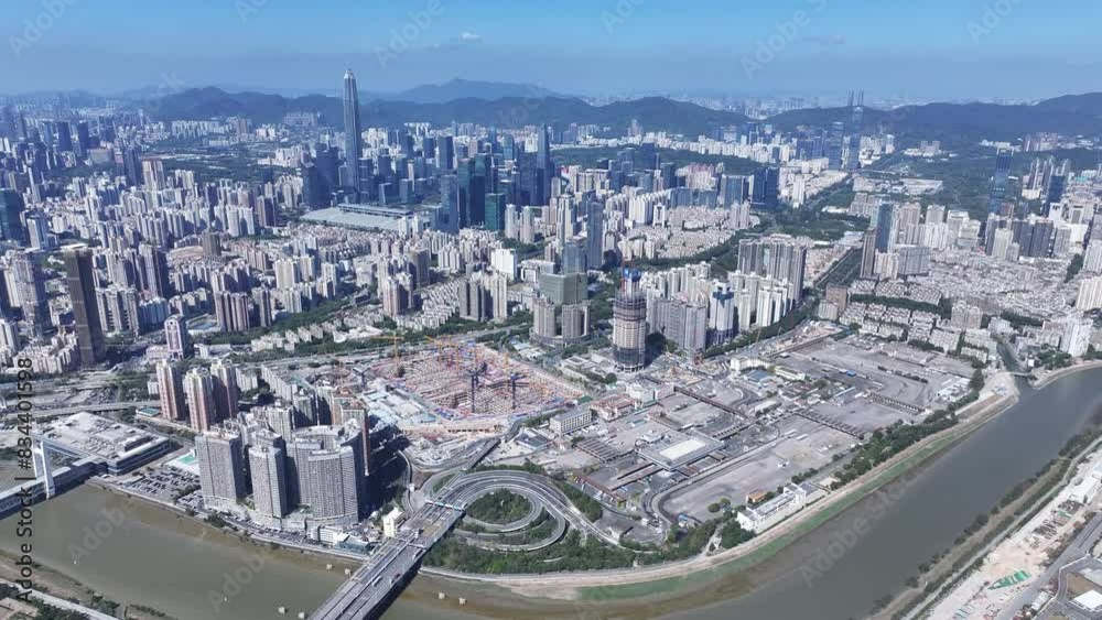 Explore the towering skyline of Shenzhen's Futian and Luohu CBD districts, epitomizing the Greater Bay Area's thriving economic powerhouse near Hong Kong Explore the towering skyline of Shenzhen's Futian and Luohu CBD districts, epitomizing the Greater Bay Area's thriving economic powerhouse near Hong Kong