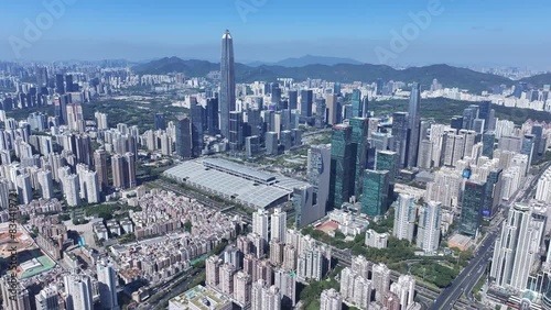 Explore the towering skyline of Shenzhen's Futian and Luohu CBD districts, epitomizing the Greater Bay Area's thriving economic powerhouse near Hong Kong photo