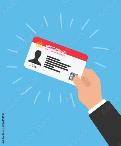 Illustration Vector Graphic of Indonesian citizen's driving license in hand