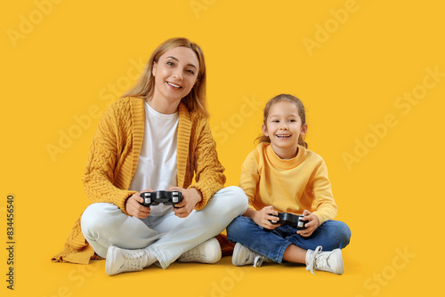 Mature woman with her littl...