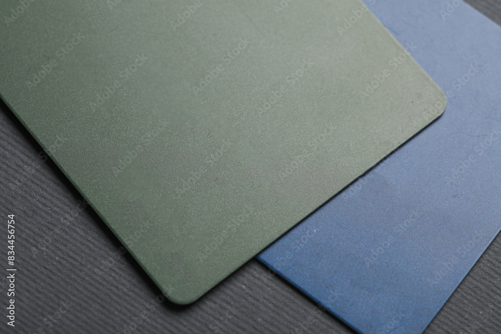 Plastic credit cards on dark gray background close up Plastic credit cards on dark gray background close up