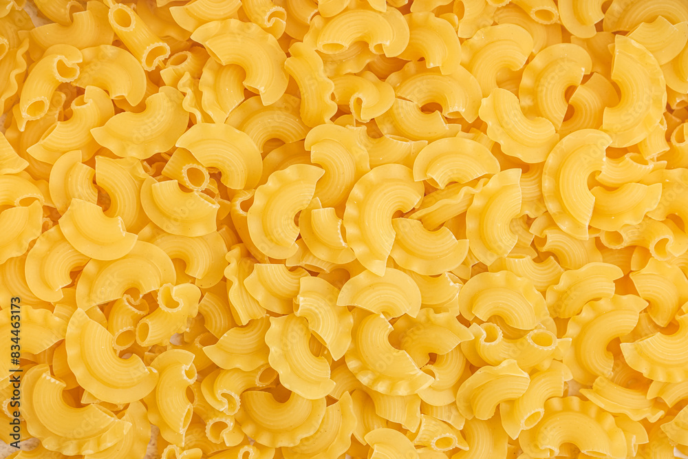 Delicious raw pasta as background Delicious raw pasta as background