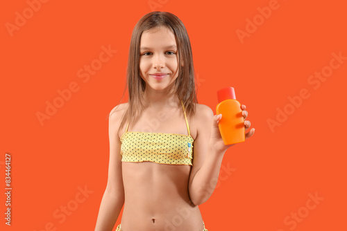 Cute little girl in swimsui...