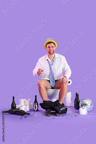 Drunk young businessman sit...