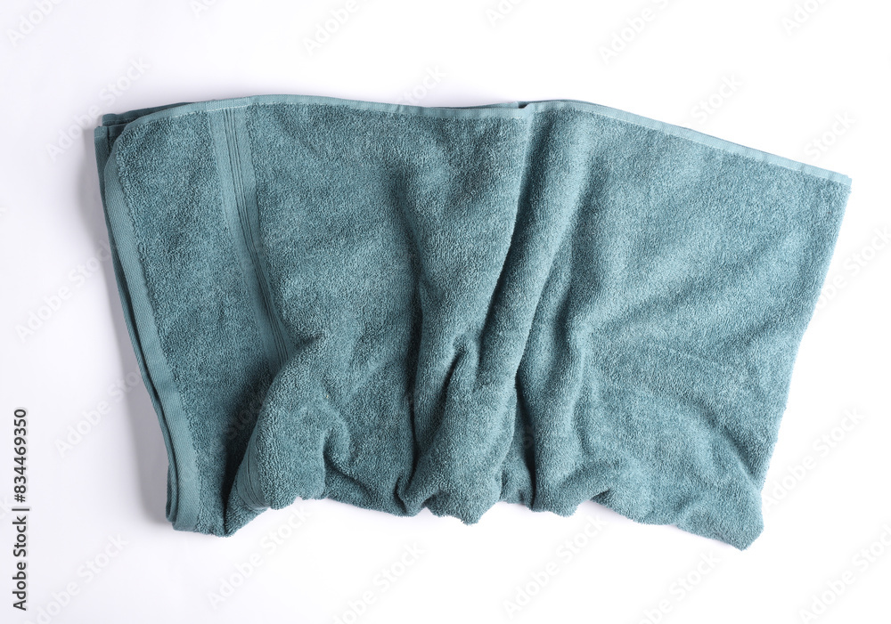 Blue crumpled towel on a white background Blue crumpled towel on a white background