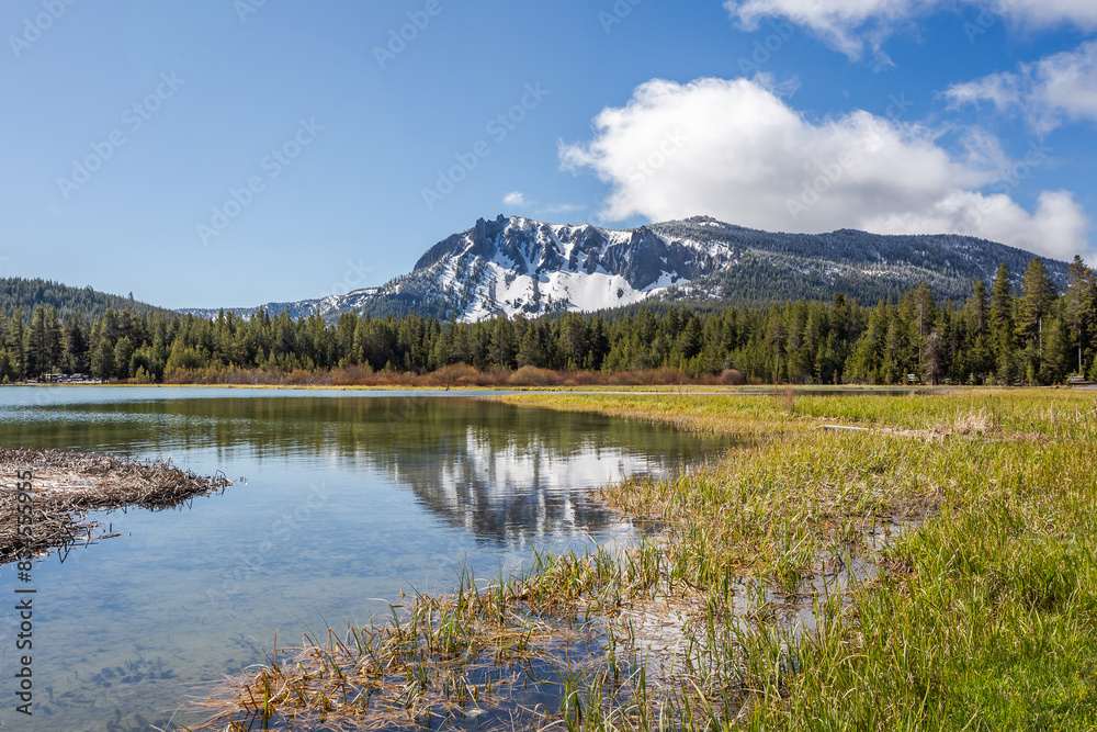 Beautiful view of the Paulina Peak reflecting in the Paulina Lake in summer Beautiful view of the Paulina Peak reflecting in the Paulina Lake in summer