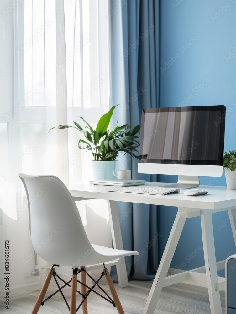 A serene home office with a white desk, a minimalist chair, and a desktop computer. The desk is adorned with a potted plant and a notebook. The background features a calming blue wall and a window A serene home office with a white desk, a minimalist chair, and a desktop computer. The desk is adorned with a potted plant and a notebook. The background features a calming blue wall and a window