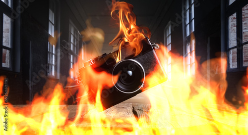 炎に包まれて火をあげて燃え炎上するデジタルカメラ photo
