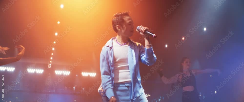 Male Singer Singing an Emotional Song. Spectacular Concert with a ...